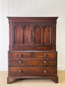 An Exceptional Early 19th Century English Oak Linen Press Housekeepers Cupboard