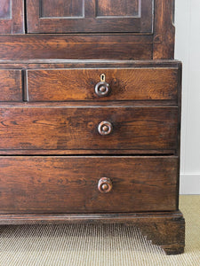 An Exceptional Early 19th Century English Oak Linen Press Housekeepers Cupboard