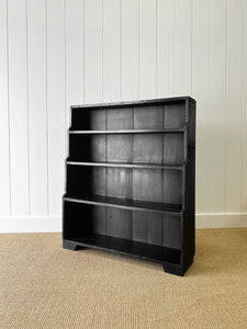 An English Ebonized 19th Century Waterfall Bookcase