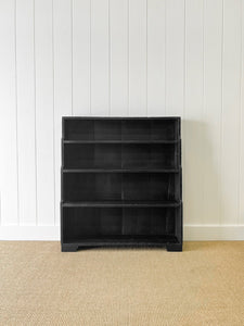 An English Ebonized 19th Century Waterfall Bookcase
