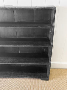 An English Ebonized 19th Century Waterfall Bookcase