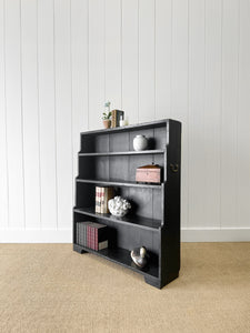 An English Ebonized 19th Century Waterfall Bookcase