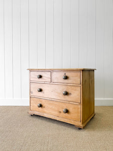 An Antique English Pine Chest of Drawers Dresser on Castors