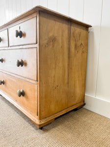 An Antique English Pine Chest of Drawers Dresser on Castors