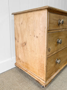 An Antique English Pine Chest of Drawers Dresser on Castors