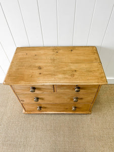 An Antique English Pine Chest of Drawers Dresser on Castors