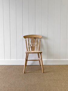 A Set of 6 Fiddleback Chairs