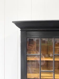 An Early 19th Century Ebonized English Secretary Bookcase