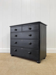 An Ebonized Antique English Chest of Drawers/Dresser