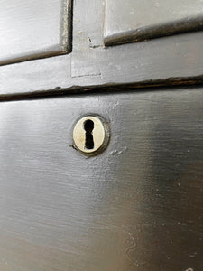 An Ebonized Antique English Chest of Drawers/Dresser