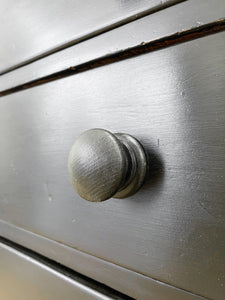 An Ebonized Antique English Chest of Drawers/Dresser