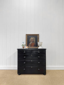 An Ebonized Antique English Chest of Drawers/Dresser