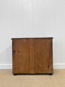 An Ebonized Antique English Chest of Drawers/Dresser