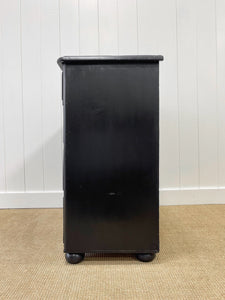 An Ebonized Antique English Chest of Drawers/Dresser