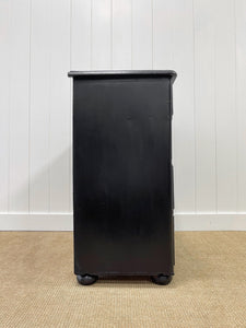 An Ebonized Antique English Chest of Drawers/Dresser