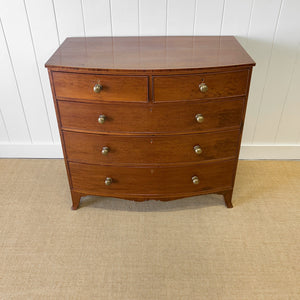 A Large Antique English Bow Front Mahogany Chest of Drawers