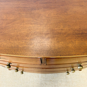 A Large Antique English Bow Front Mahogany Chest of Drawers