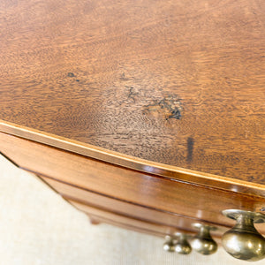 A Large Antique English Bow Front Mahogany Chest of Drawers