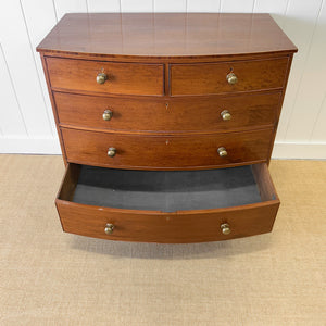 A Large Antique English Bow Front Mahogany Chest of Drawers