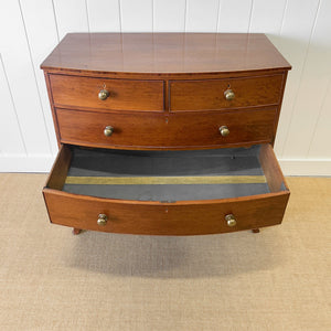 A Large Antique English Bow Front Mahogany Chest of Drawers