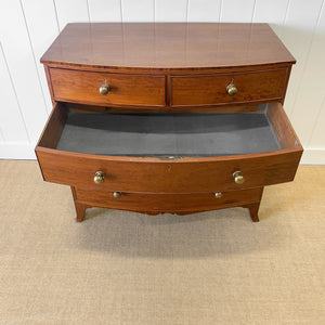 A Large Antique English Bow Front Mahogany Chest of Drawers