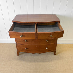 A Large Antique English Bow Front Mahogany Chest of Drawers