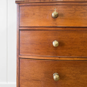 A Large Antique English Bow Front Mahogany Chest of Drawers