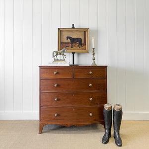 A Large Antique English Bow Front Mahogany Chest of Drawers