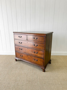 A English Georgian Oak Chest of Drawers with Swan Neck Hardware