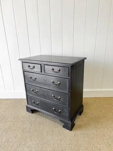 A Vintage English Ebonized English Chest of Drawers/Dresser