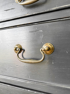 A Vintage English Ebonized English Chest of Drawers/Dresser