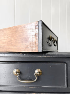 A Vintage English Ebonized English Chest of Drawers/Dresser