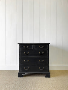 A Vintage English Ebonized English Chest of Drawers/Dresser