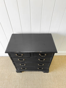 A Vintage English Ebonized English Chest of Drawers/Dresser
