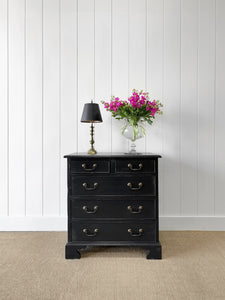 A Vintage English Ebonized English Chest of Drawers/Dresser