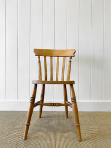 A Vintage Set of 8 Slat Back Ash Chairs