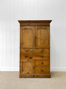 An 18th Century English Pine Linen Press Cupboard