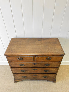 An Early 19th Century English Country Made Oak Chest of Drawers or Dresser