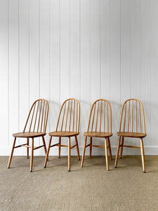 A Set of 4 Pine Ercol Chairs