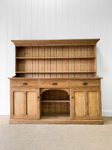 An Early 19th Century Monumental Pine Welsh Dresser or Cupboard