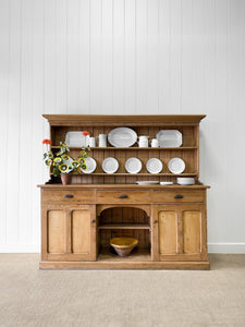 An Early 19th Century Monumental Pine Welsh Dresser or Cupboard