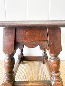 An Old Antique English Oak Stool