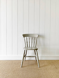 A Vintage Set of 4 Spindle Back Chairs
