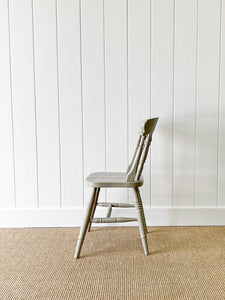 A Vintage Set of 4 Spindle Back Chairs