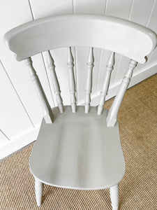A Vintage Set of 4 Spindle Back Chairs