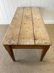 An Antique English Country Pine 6ft Dining Table on Casters