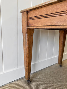 An Antique English Country Pine 6ft Dining Table on Casters