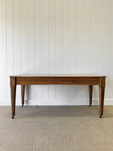 An Antique English Country Pine 6ft Dining Table on Casters