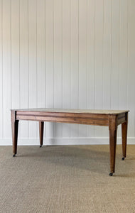 An Antique English Country Pine 6ft Dining Table on Casters