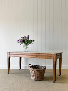 An Antique English Country Pine 6ft Dining Table on Casters